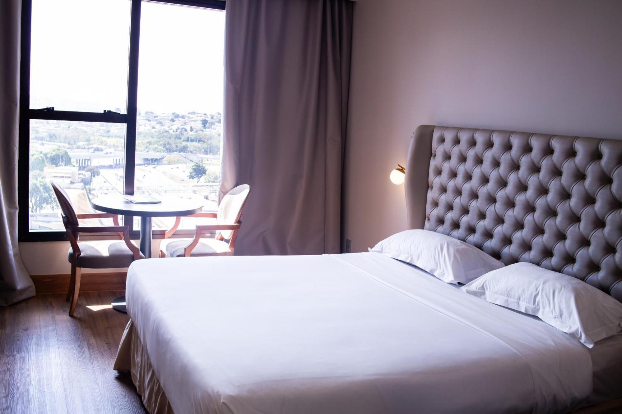 Ouro Minas Hotel Belo Horizonte, Dolce By Wyndham Exterior photo A bedroom at the hotel